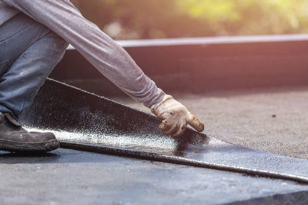 Professional Basement Waterproofing technician working in Lewisville, WA